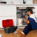 Plumbing professional doing his job