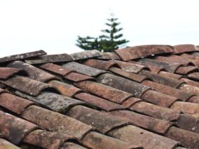 Selective Focus Photo of Brown Roof Shingles