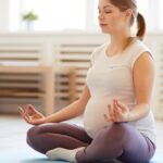 Pregnant woman doing yoga
