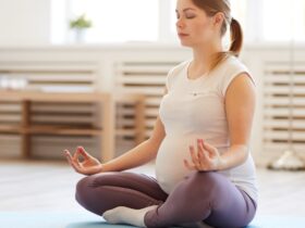 Pregnant woman doing yoga