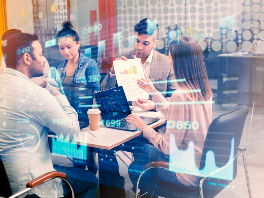 A new IT team being briefed on the company's AI management system