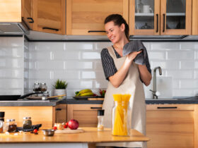 smiley woman at home kitchen