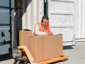 Medium shot man writing on box