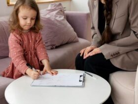 A little girl is drawing