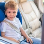 Child seated in a Car