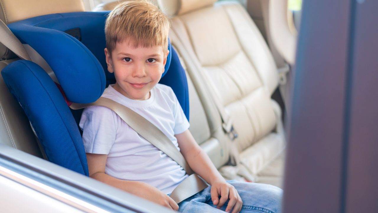 Child seated in a Car