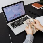 A Person Holding Bank Notes