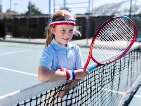 Girl Wearing Sportswear Standing by the Tennis Net
